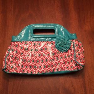 Teal/patterned Vera Bradley frill clutch with rose